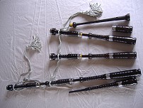 Handmade bagpipe made from African Blackwood with wooden button & chromed nickel mounts at $1590 NZ